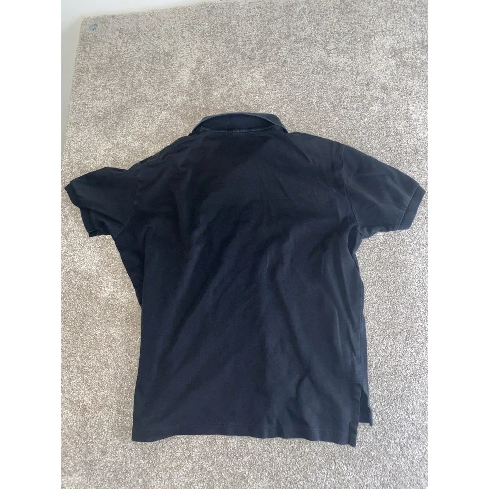 Ralph Lauren pictured hole