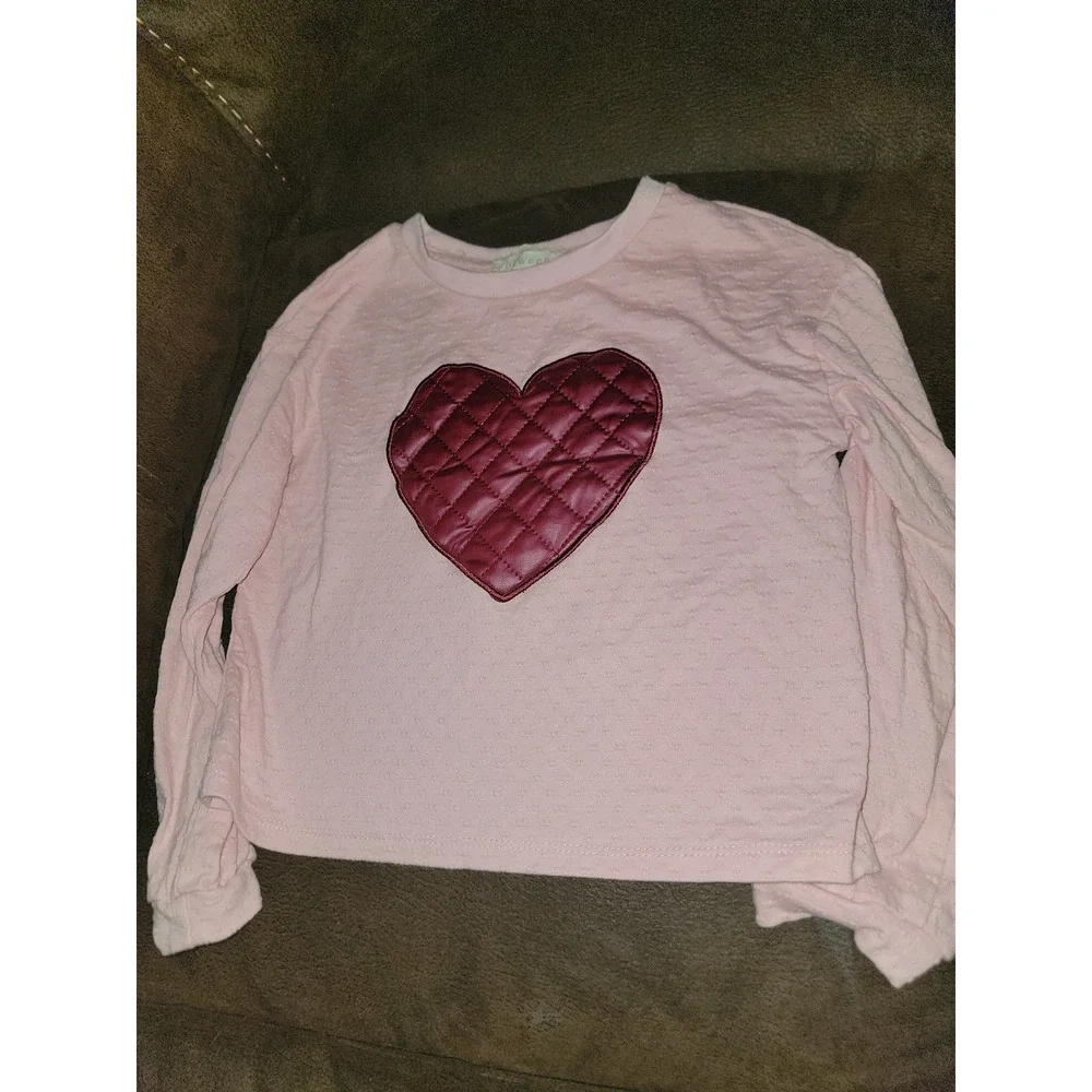 btween pink heart