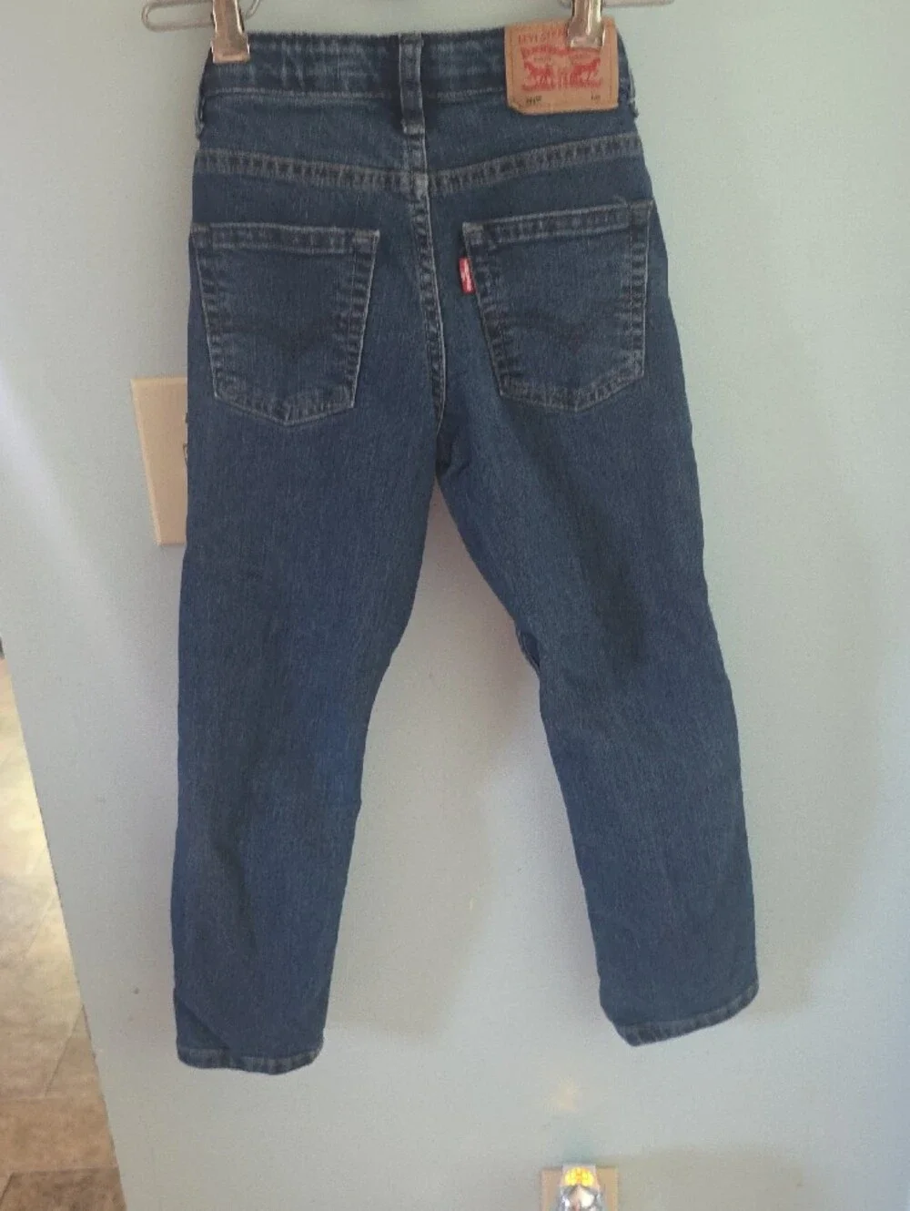 Levi's Blue Denim Straight Jeans with Red Waistband Accent