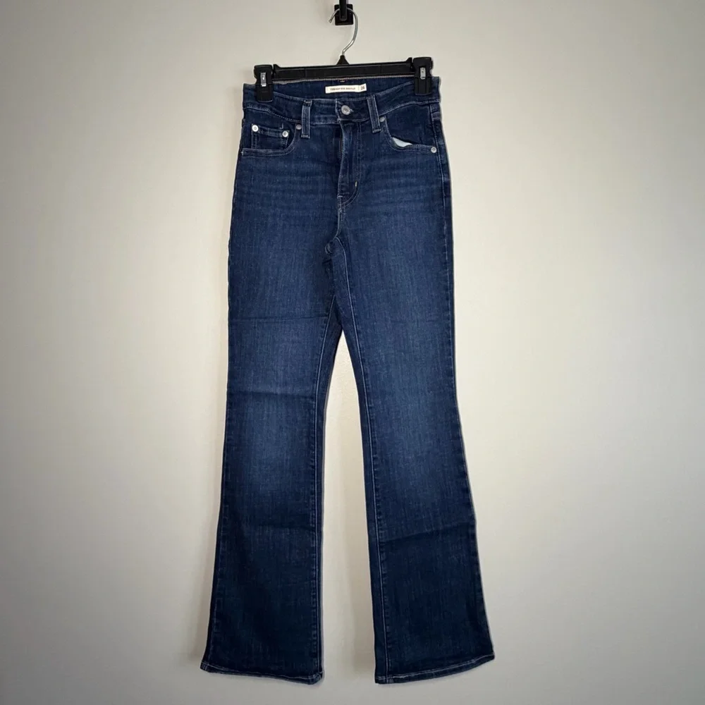 Never worn - Levi's Dark Blue Boot Cut Jeans