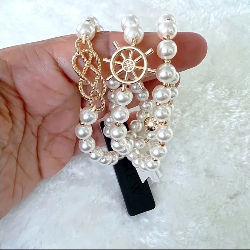 J. Crew three unique beads