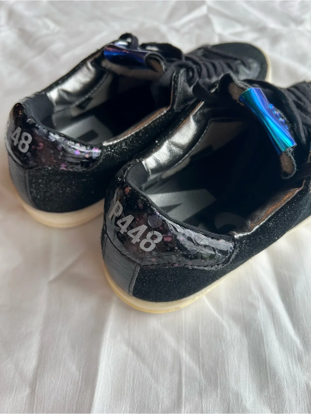 P448 black glitter