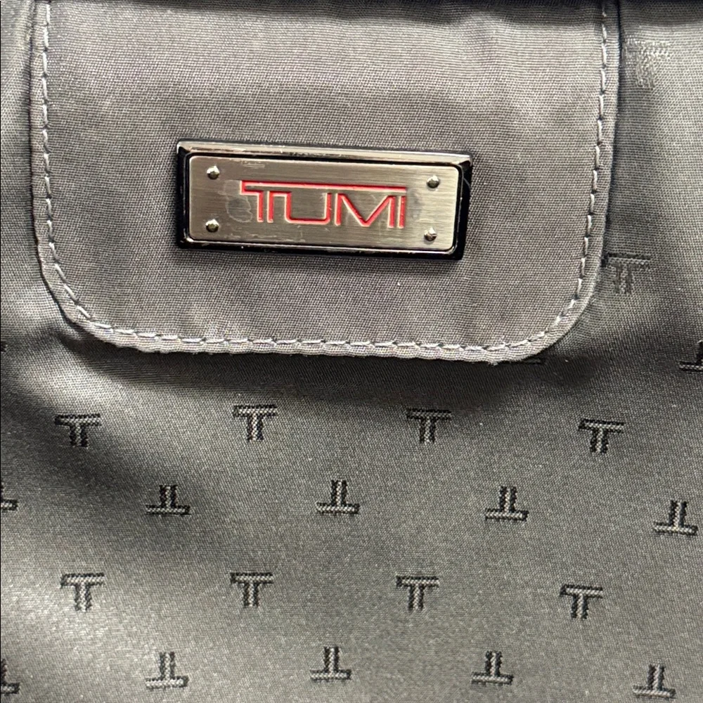 Tumi black removable bottom