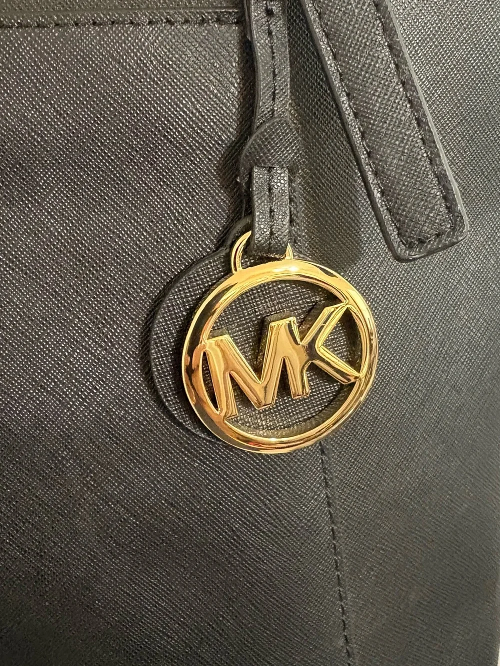 Michael Kors travel declined