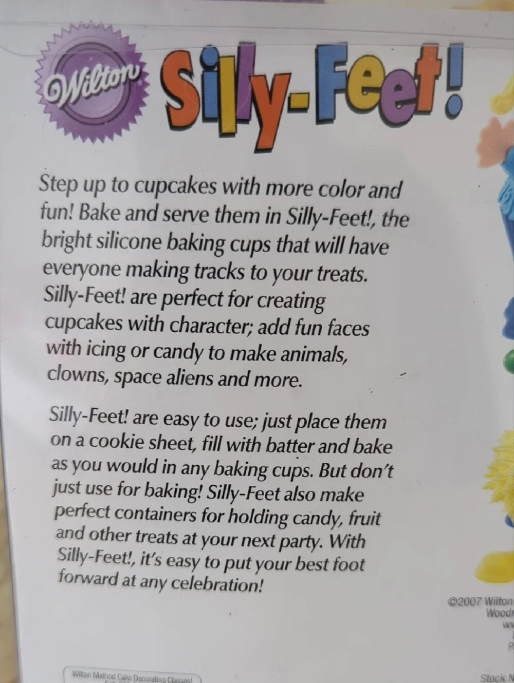 Wilton Silly-Feet Silicone Baking Cups - Yellow, Purple, Blue & Orange (8 Cups)
