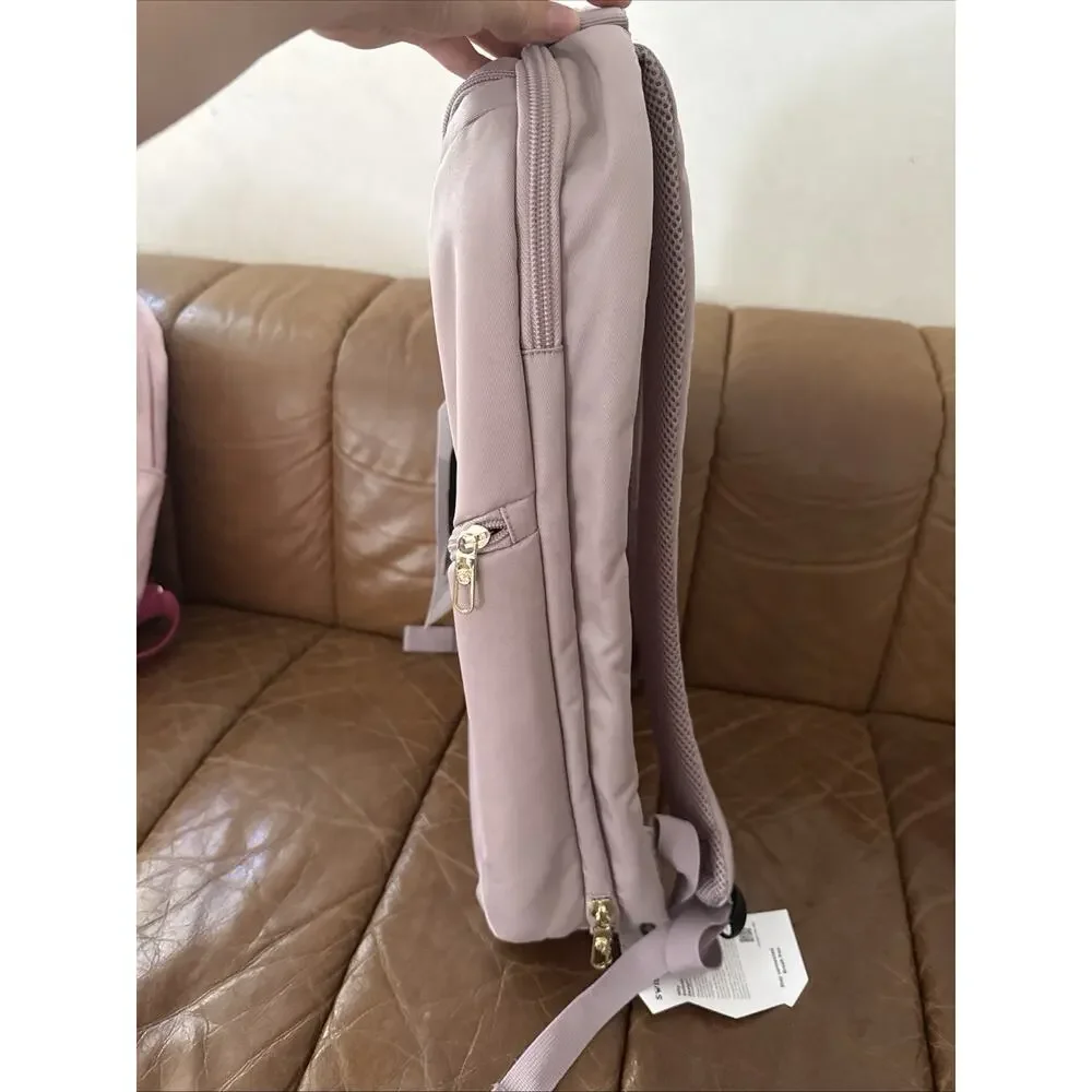 Swissdigital Design Multi-functional 2-In-1 Travel Backpack/Suitcase Mauve Pink