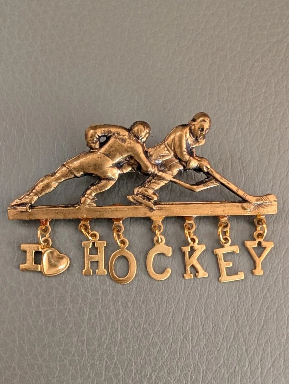 N/A brass pinback