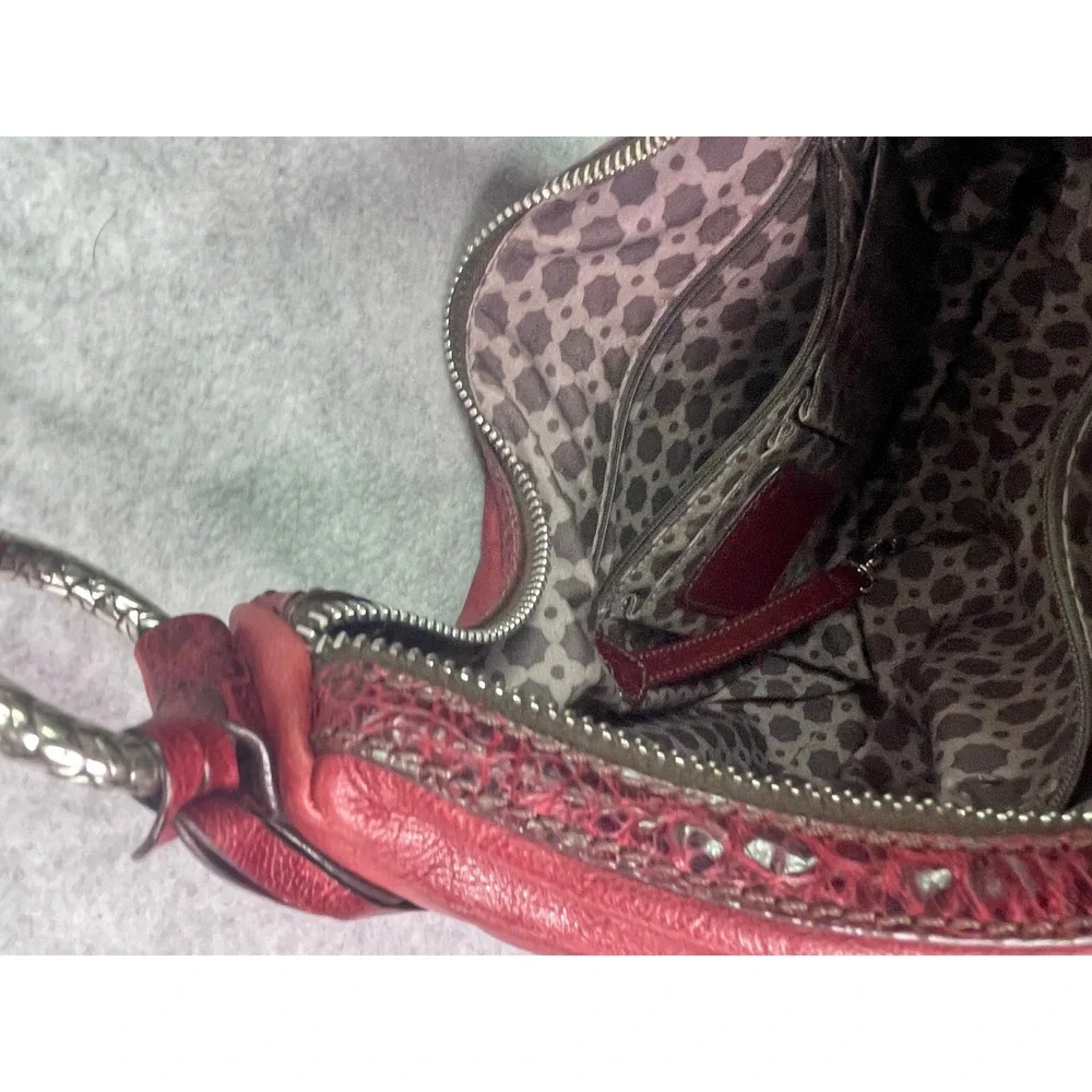Brighton expandable unzips