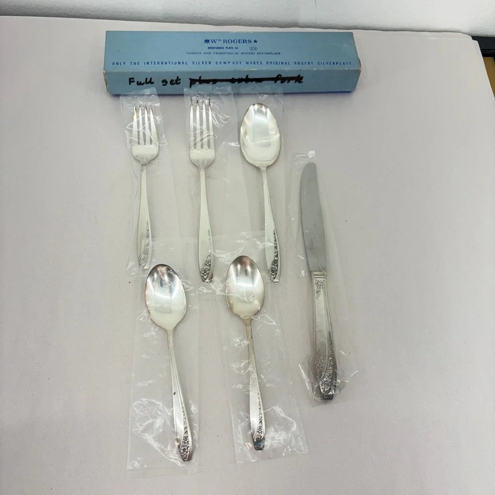 Wm Rogers pieces floral spoon