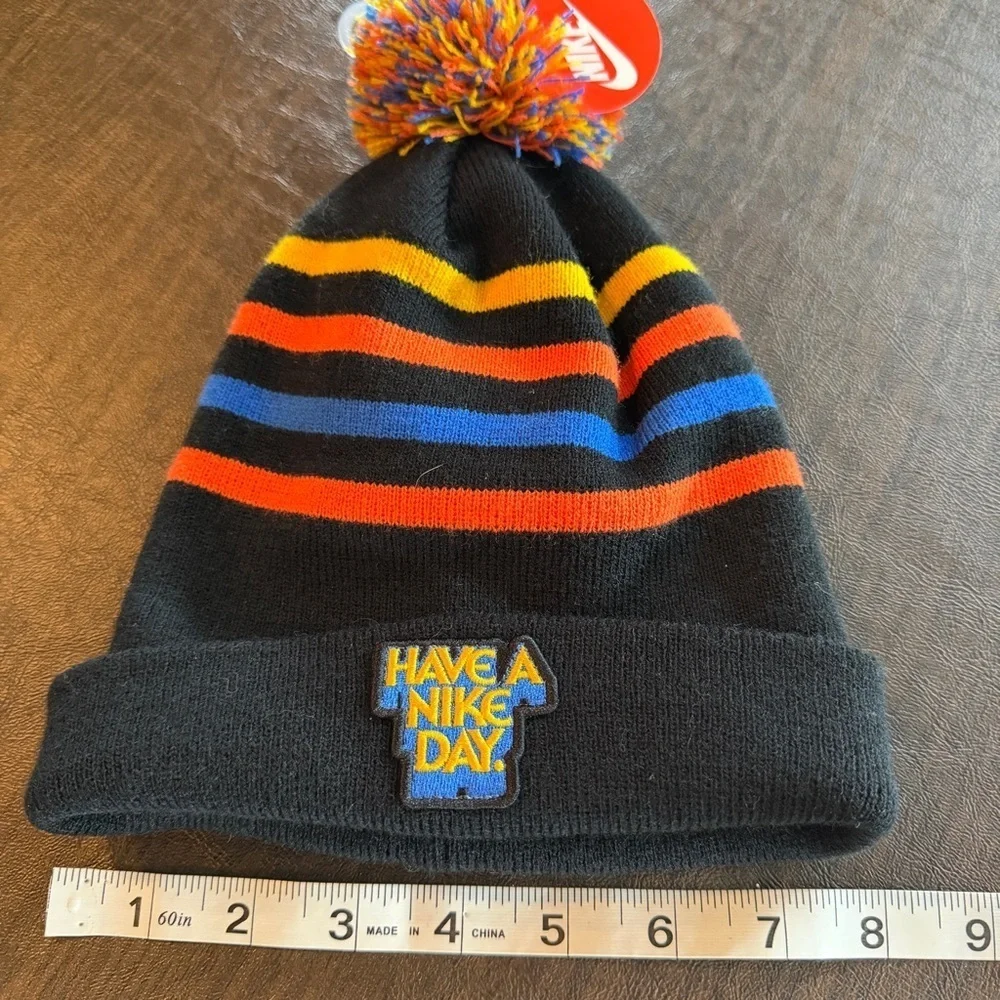 Nike striped pom