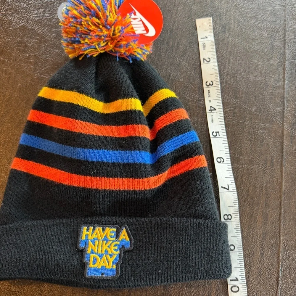 Nike striped pom