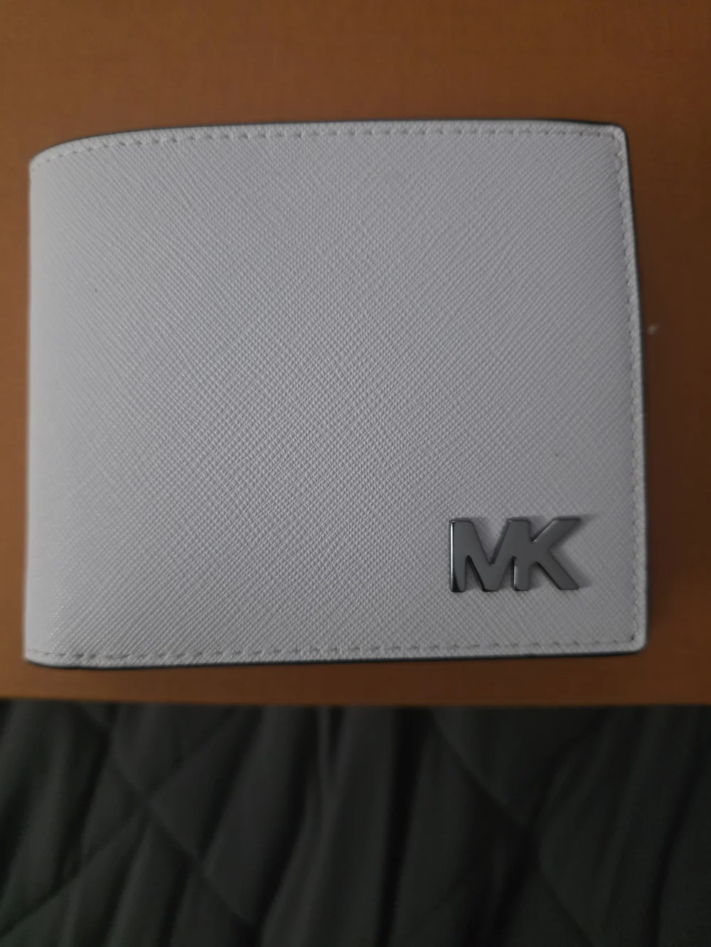 Michael Kors exterior wallet accent