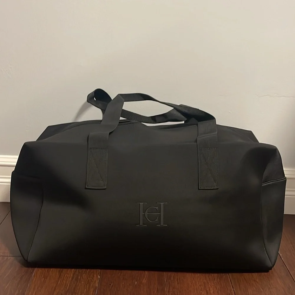 Carolina Herrera bad boy top handle weekend bag