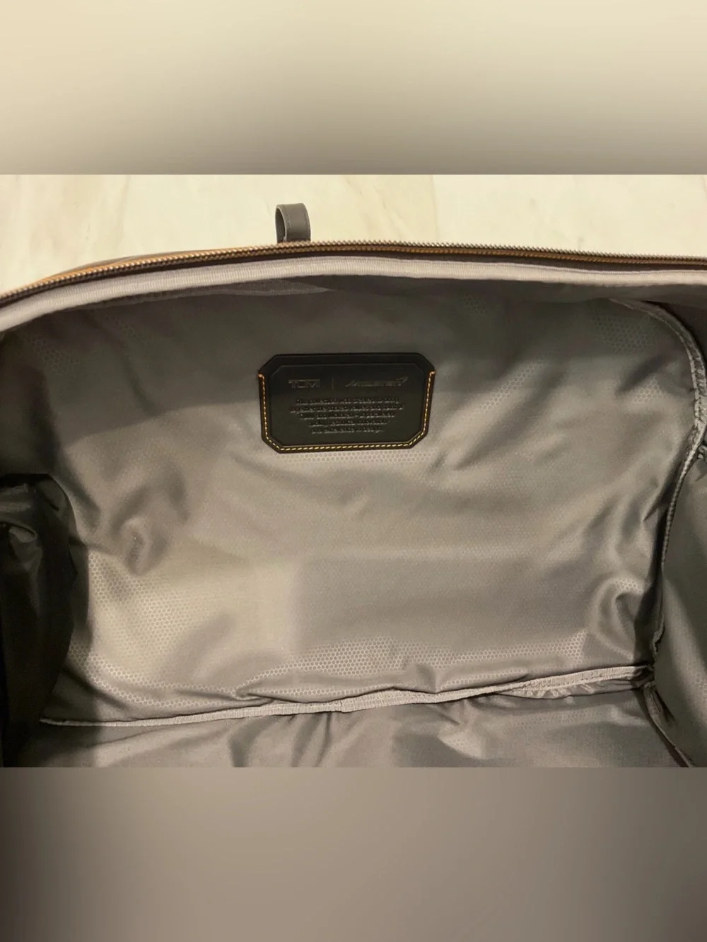 Tumi up sale
