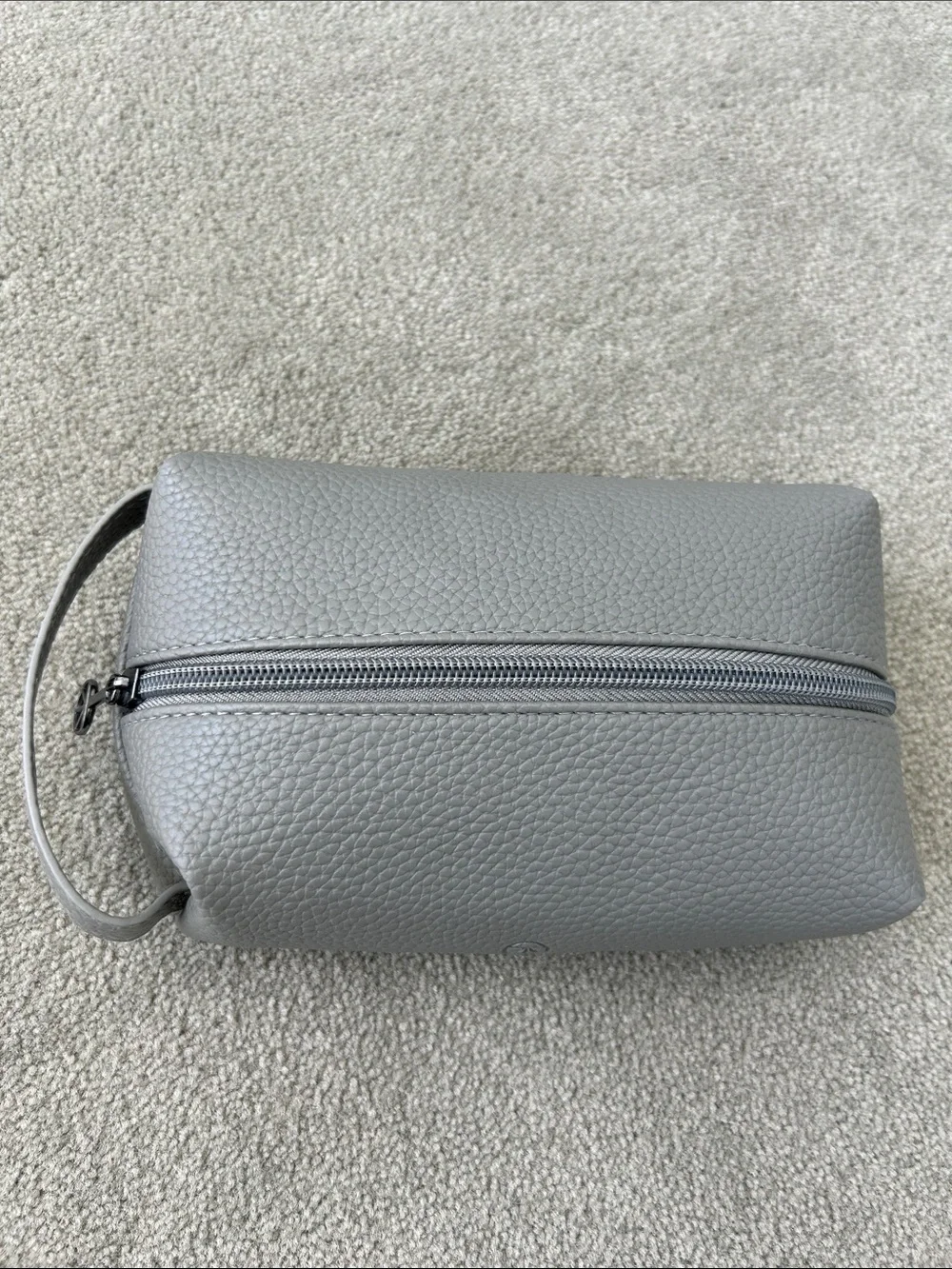 Therabody Grey Pebbled Leather Travel Pouch from United Airlines