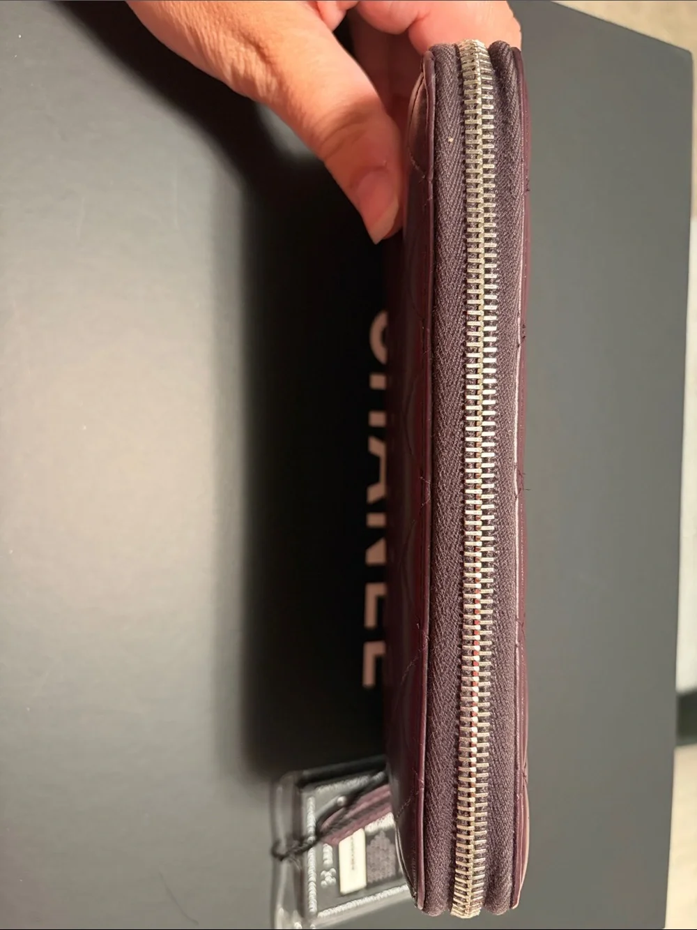 CHANEL quilted zip