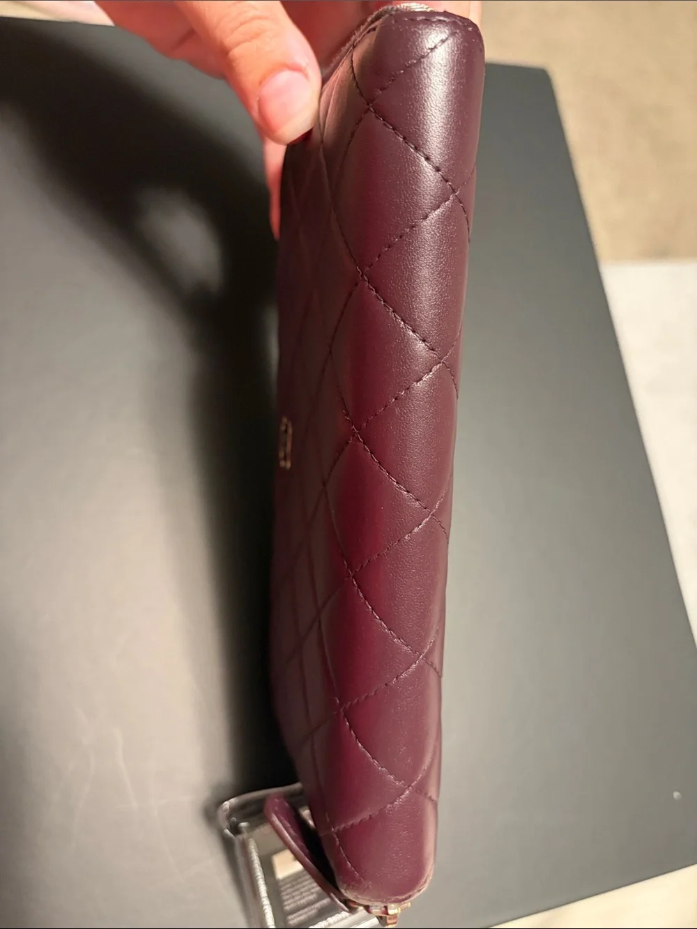 CHANEL quilted zip