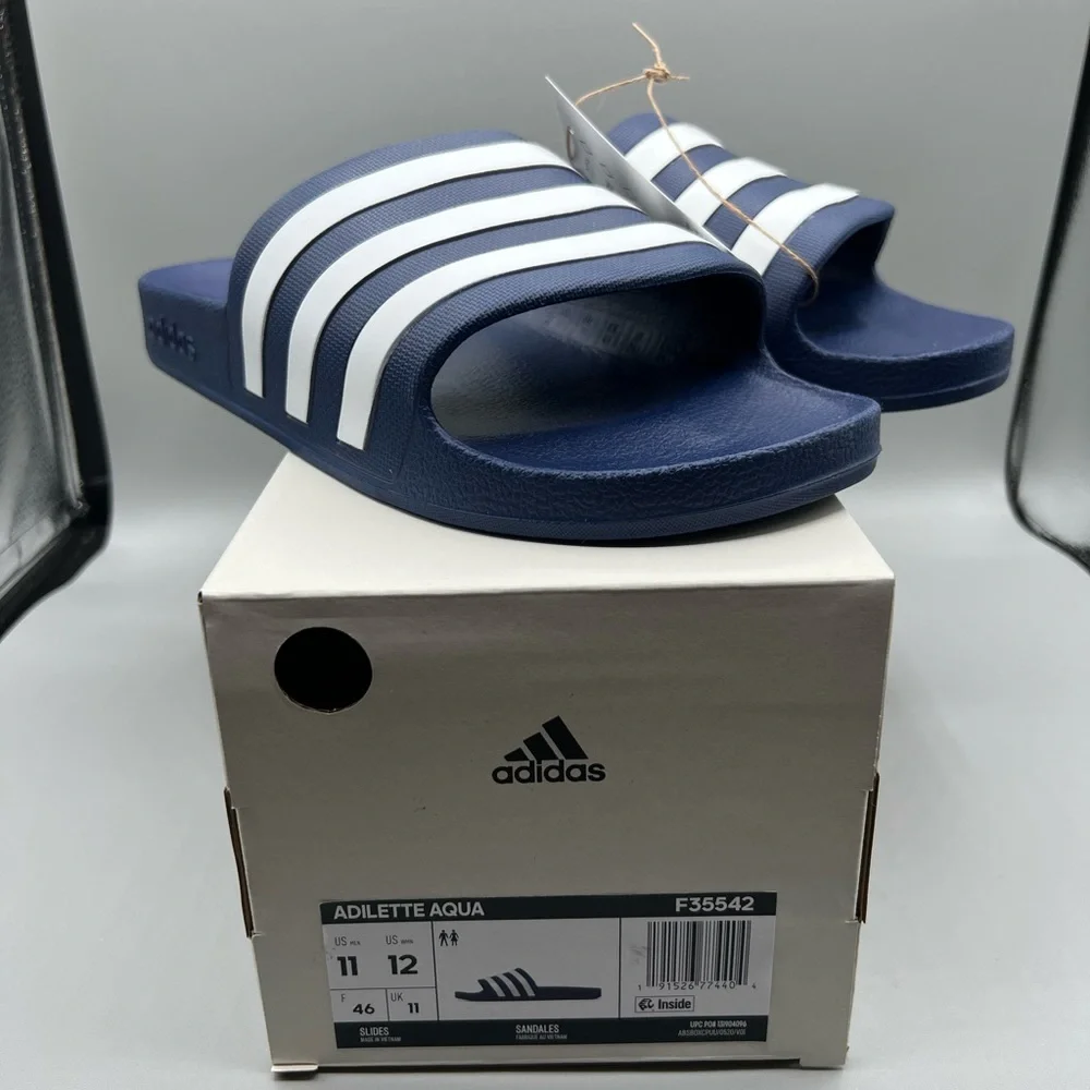 adidas Unisex Adilette Aqua Slides Sandal, Dark Blue/White/Dark Blue, 11‎ US Men