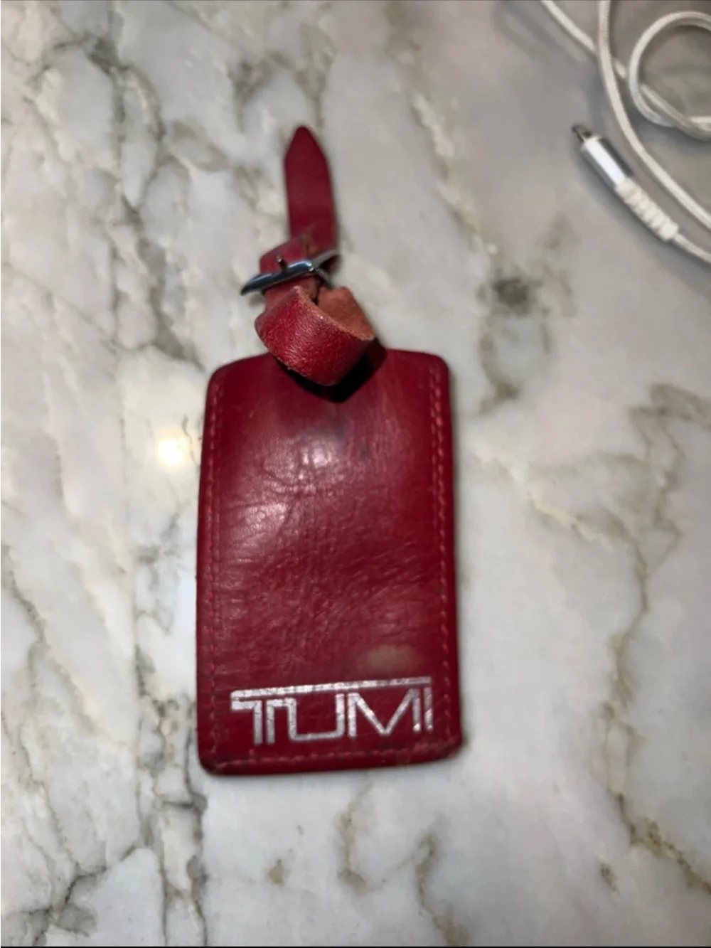 Tumi leather luggage