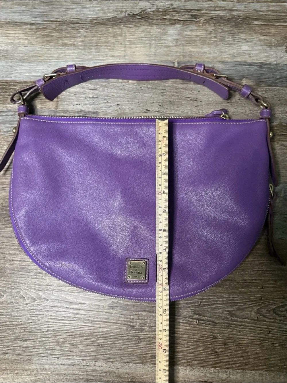 Dooney & Bourke expands opens