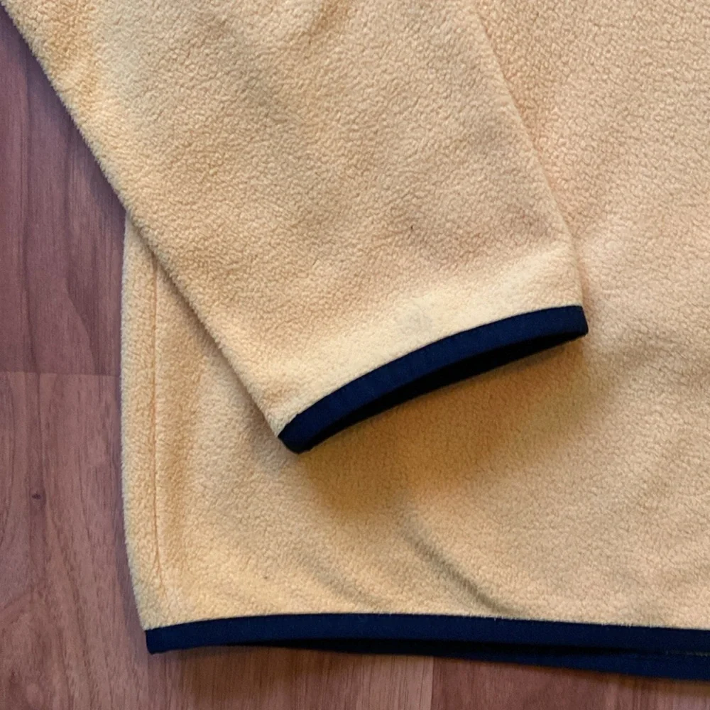 The North Face gold black