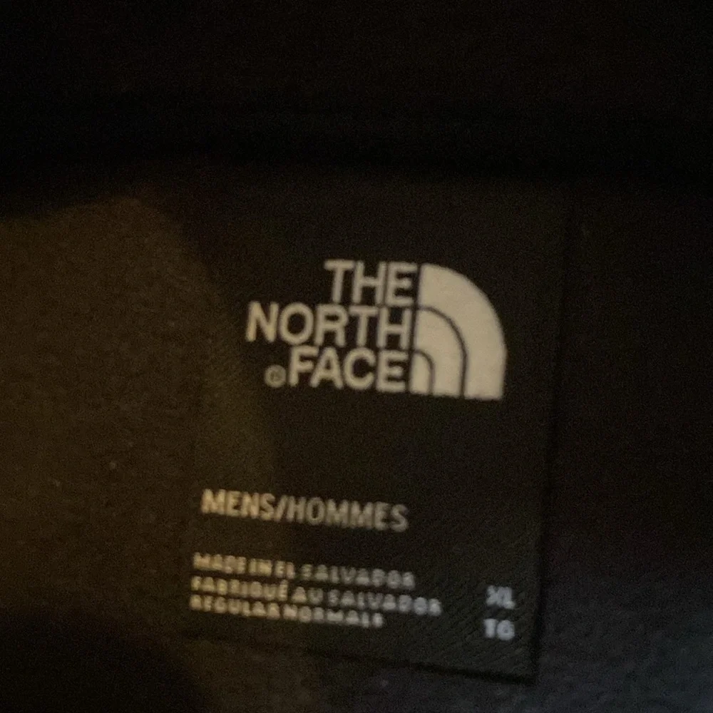 The North Face gold black