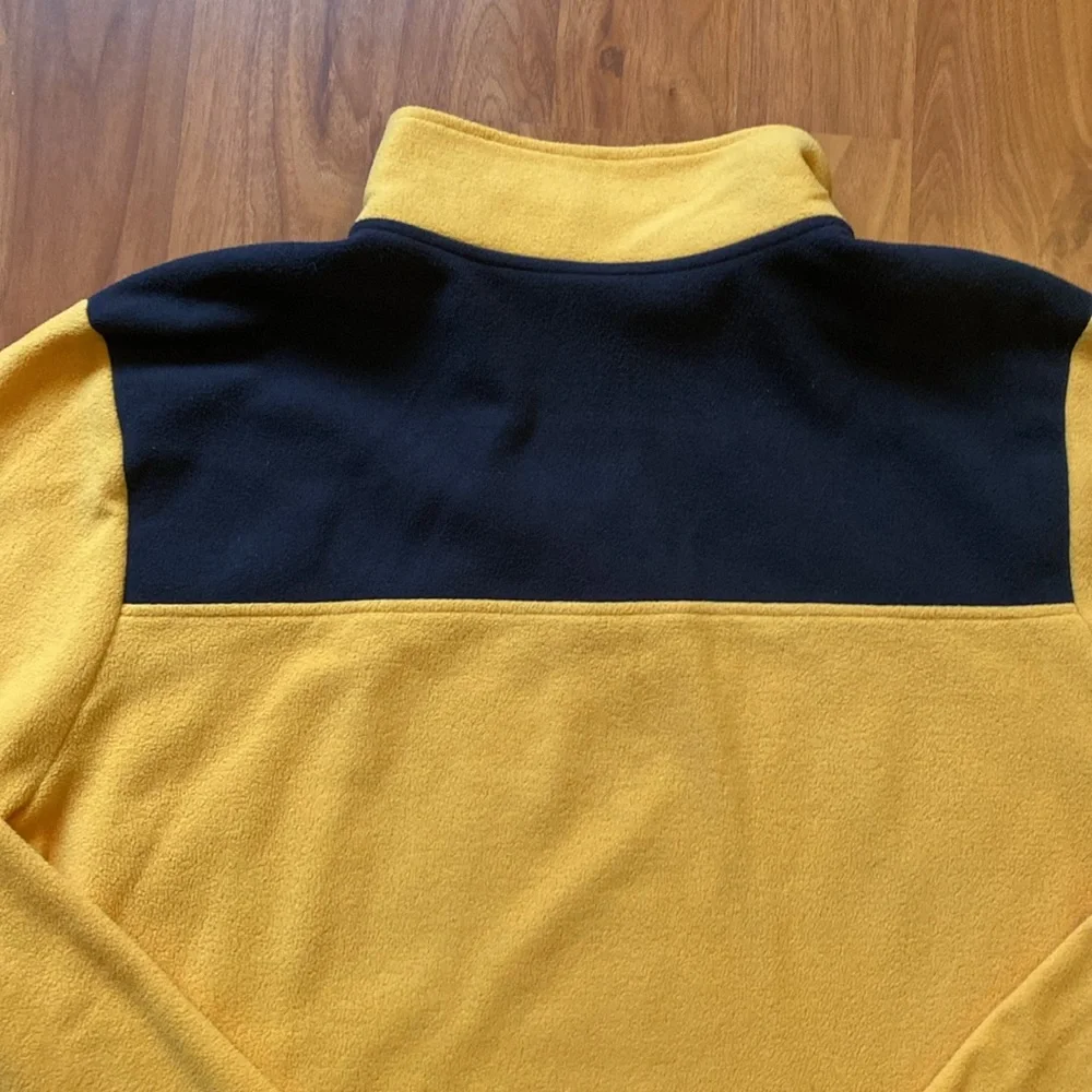 The North Face gold black