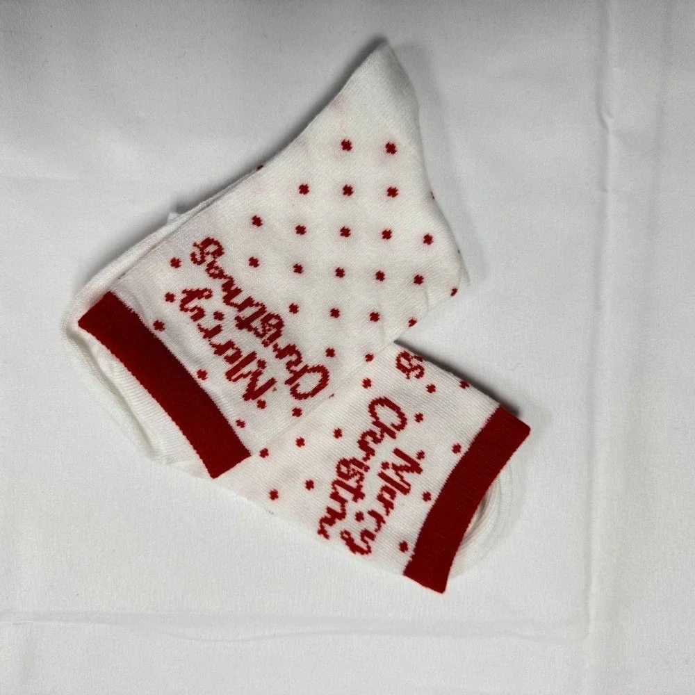 Women's Christmas-themed crew socks NEW in Bag.‎