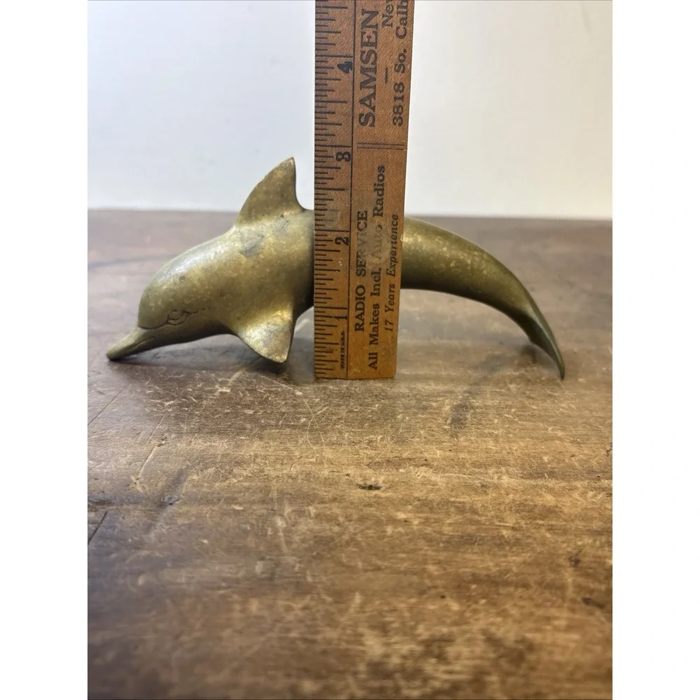 N/A brass dolphin