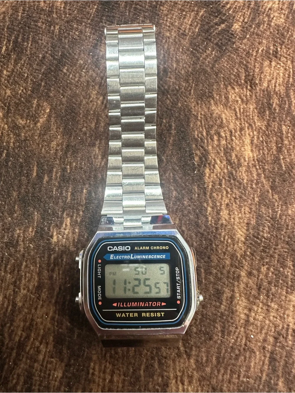 Casio Silver Stainless Steel Digital Watch with Black Dial Accents