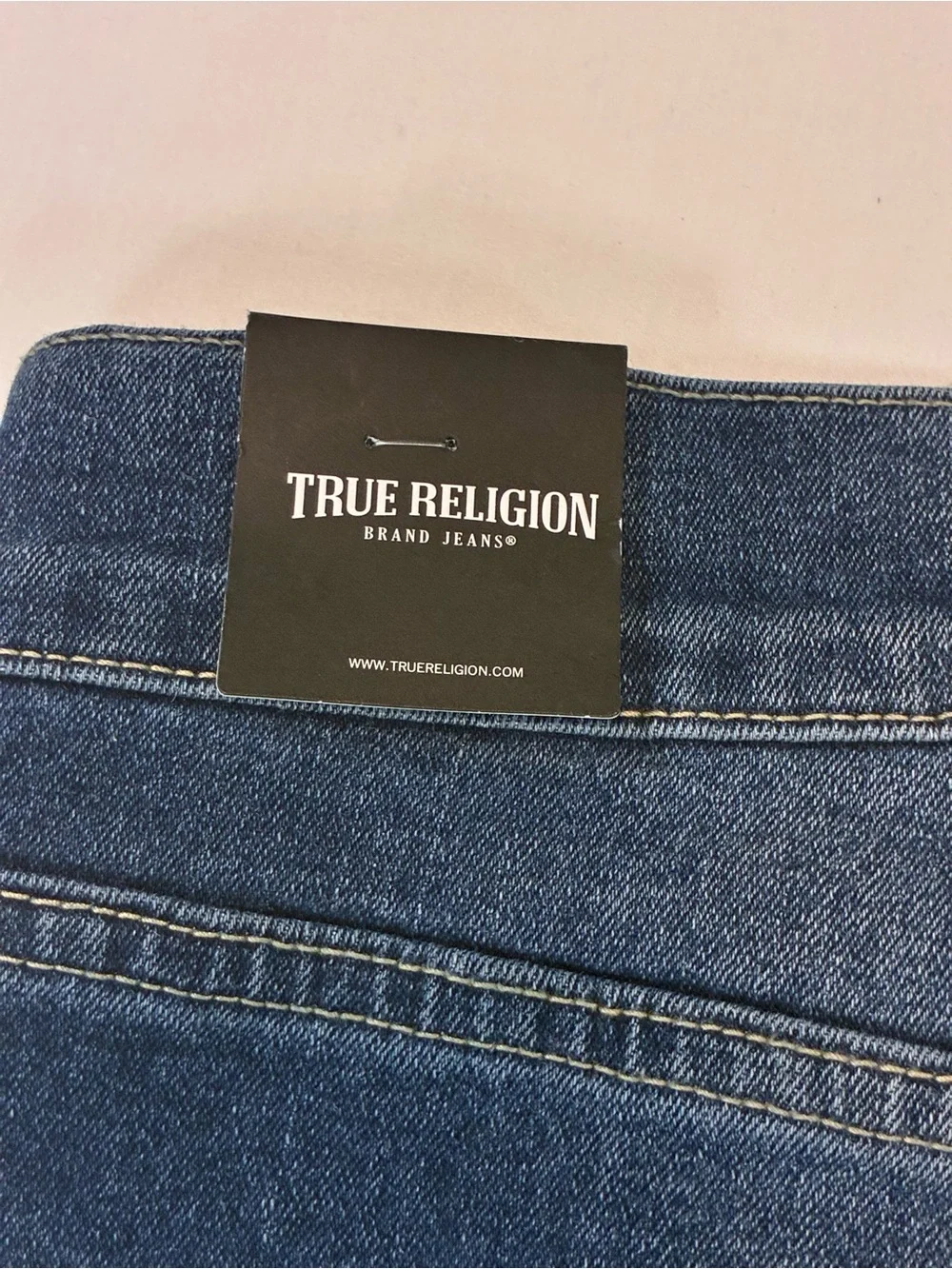 True Religion styling by thigh