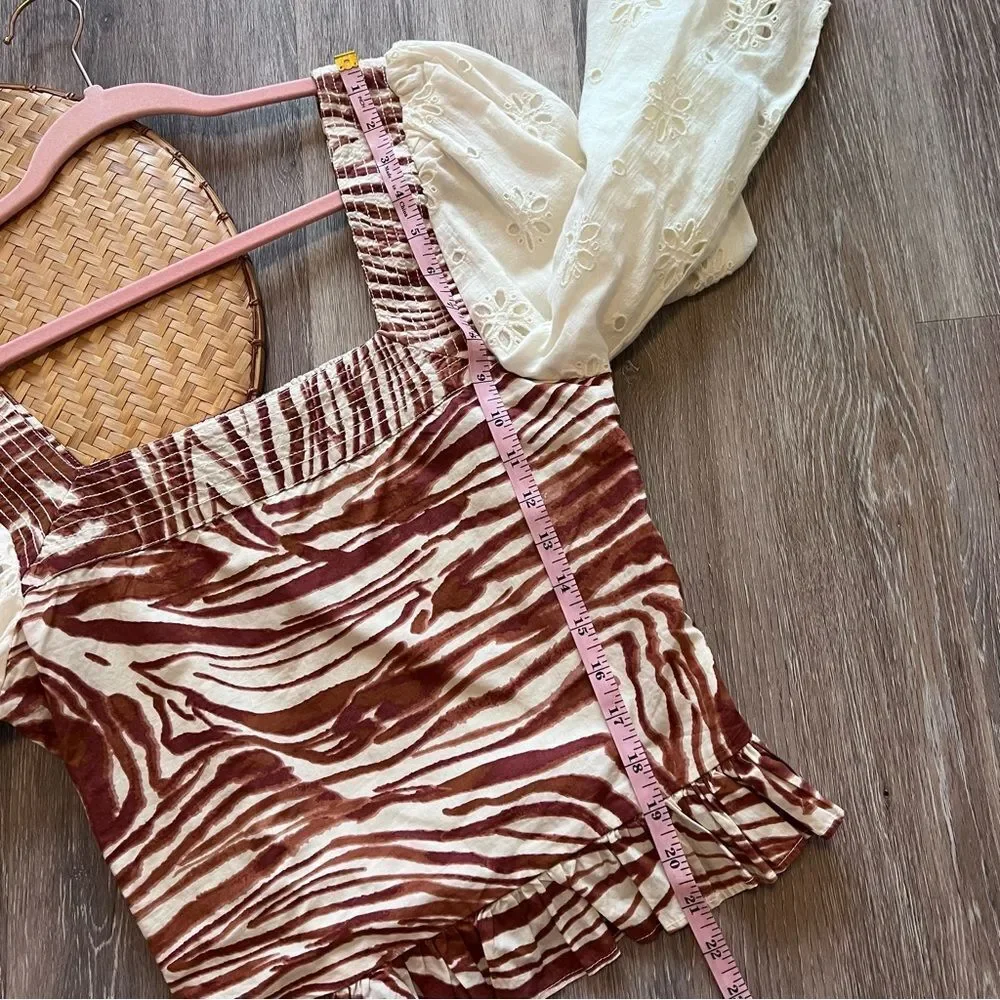 Anthropologie love the label‎ zebra laser cut puff sleeve smocked blouse
