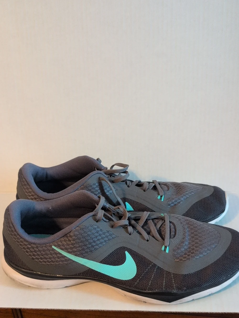 Nike Women's Gray Athletic Running Shoes with Teal Swoosh