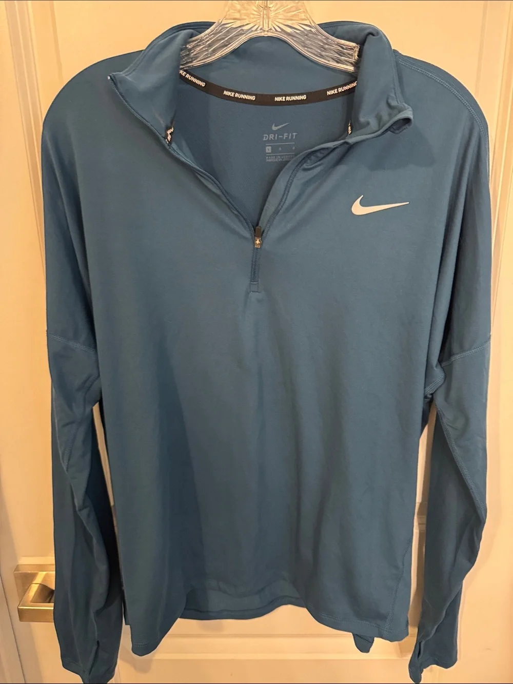 Nike Dri-FIT Long Sleeve Quarter-Zip Top in Teal Blue