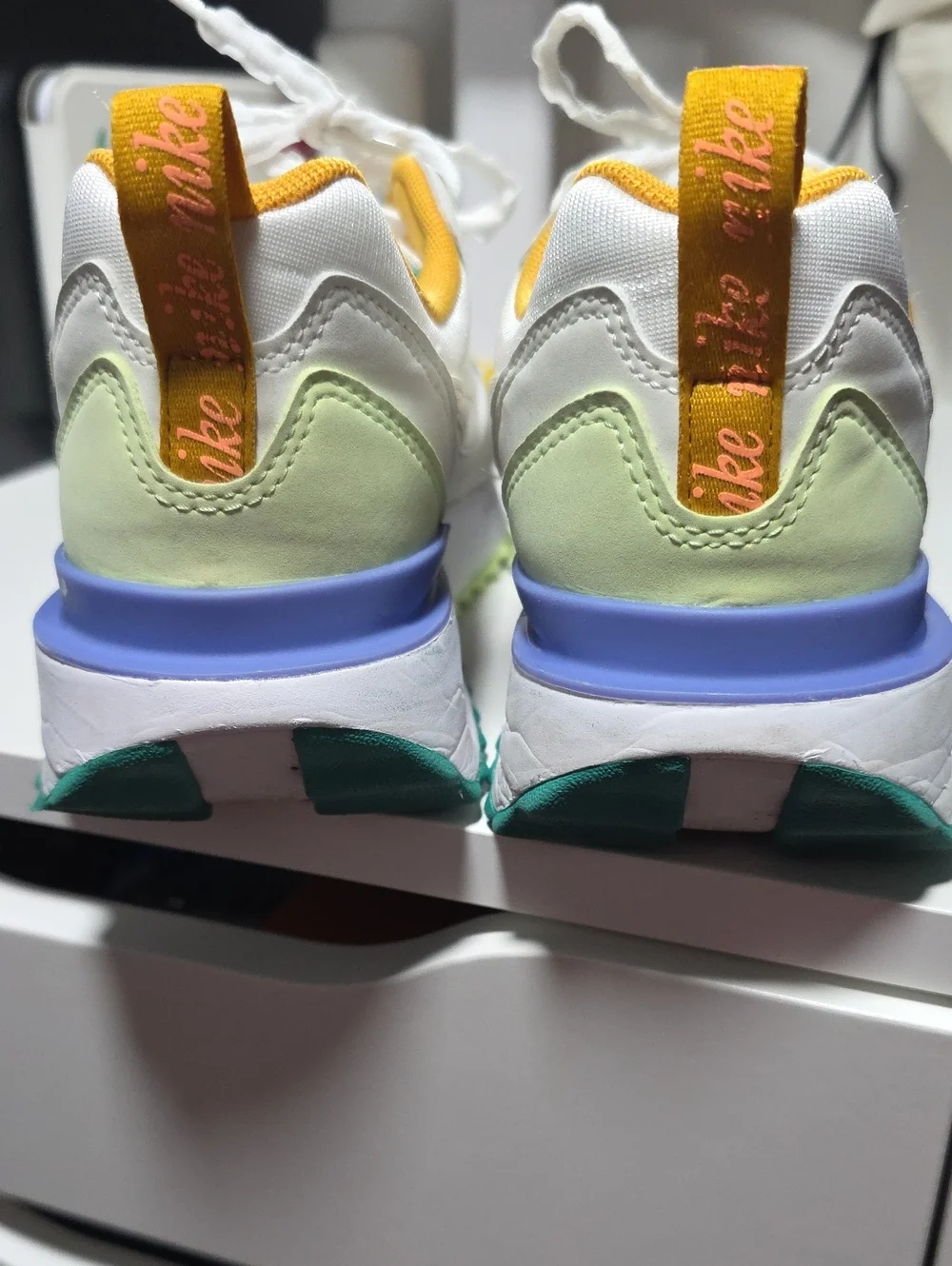 NikeWhite Sneakers with Yellow, Light Green & Purple Accents Size 7