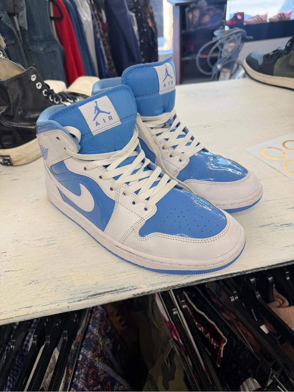 Air Jordan 1 Mid “University Blue” (white/light blue patent leather).  Sz 10
