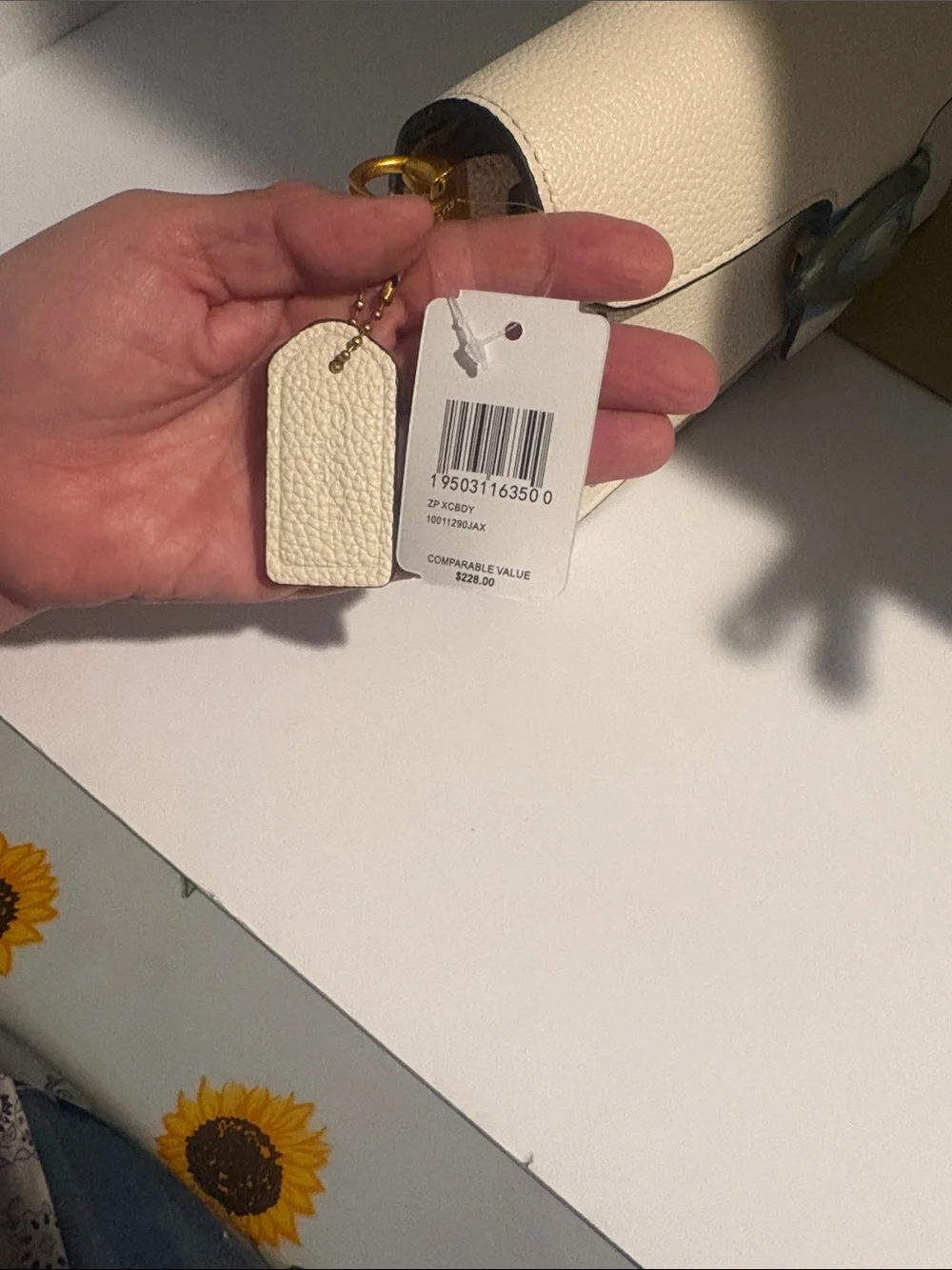 Coach Cream Pebbled Leather Clutch with Gold 'C' Accent