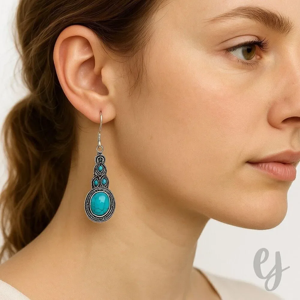 The Mavi Turquoise Blue Dangle Earrings in Silver Tone