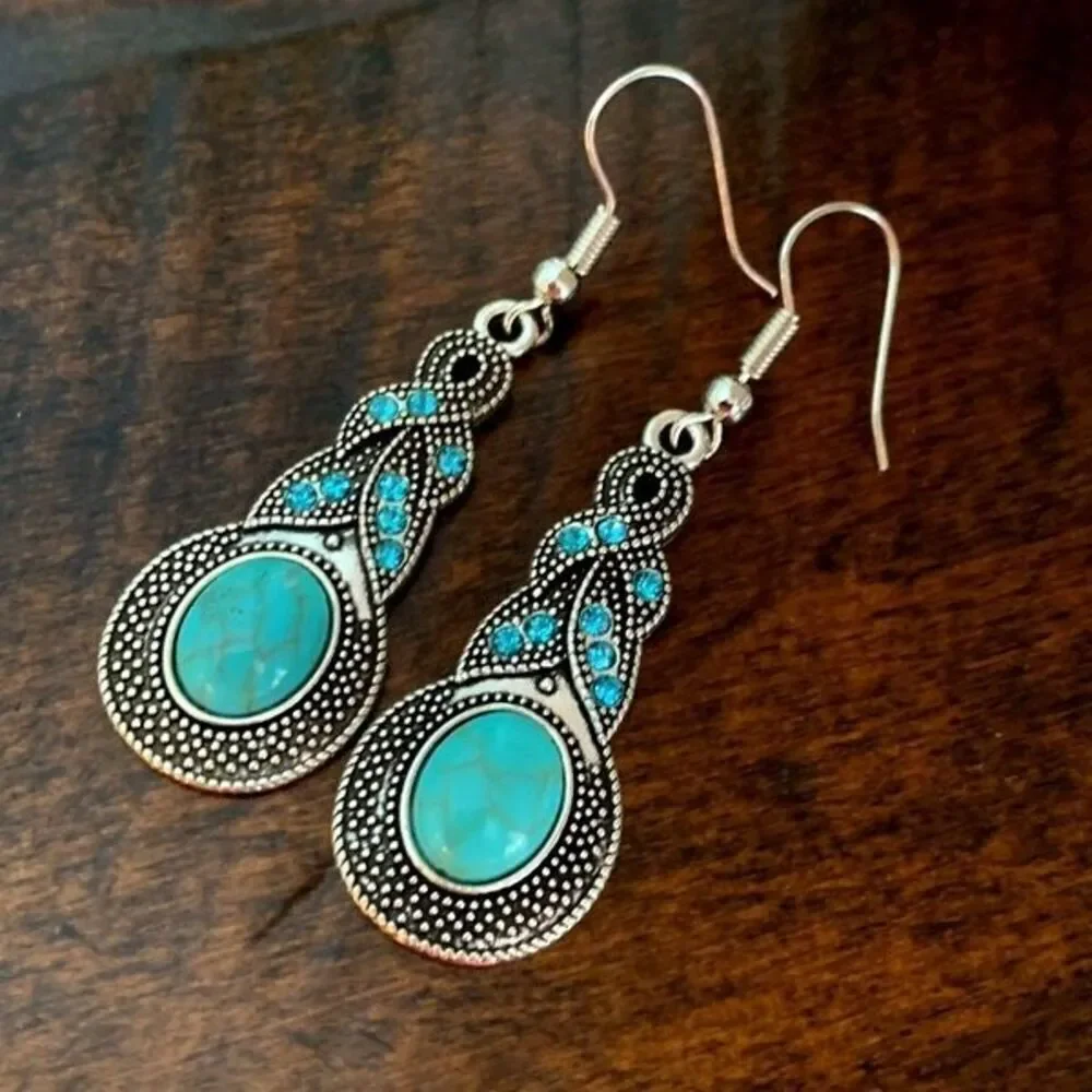 The Mavi Turquoise Blue Dangle Earrings in Silver Tone