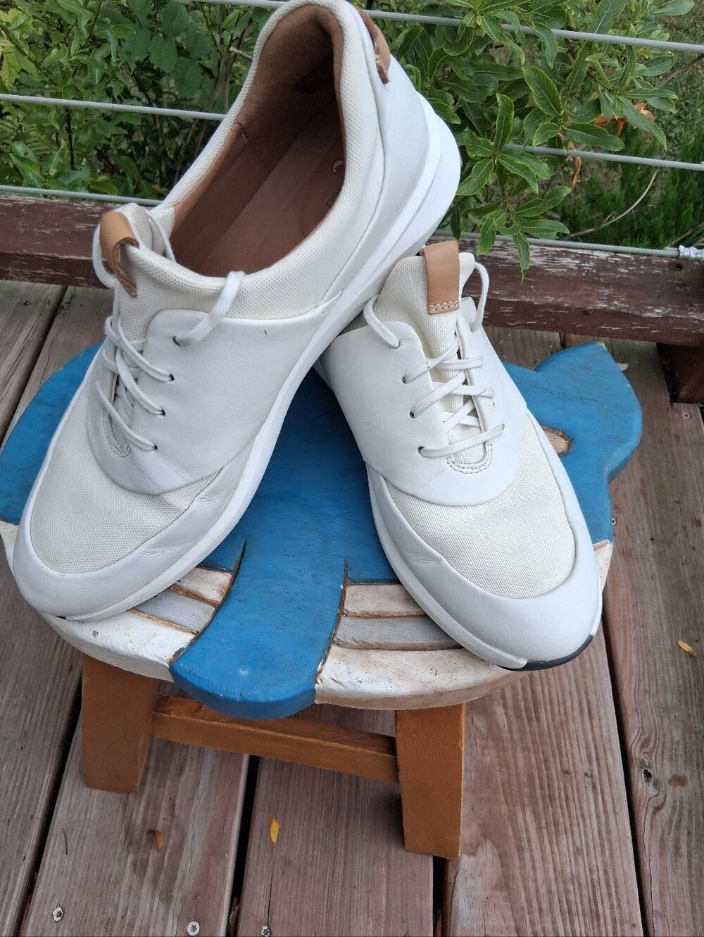 Womens White Casual Sneakers with Tan Accents. Body of Shoe Winter White.