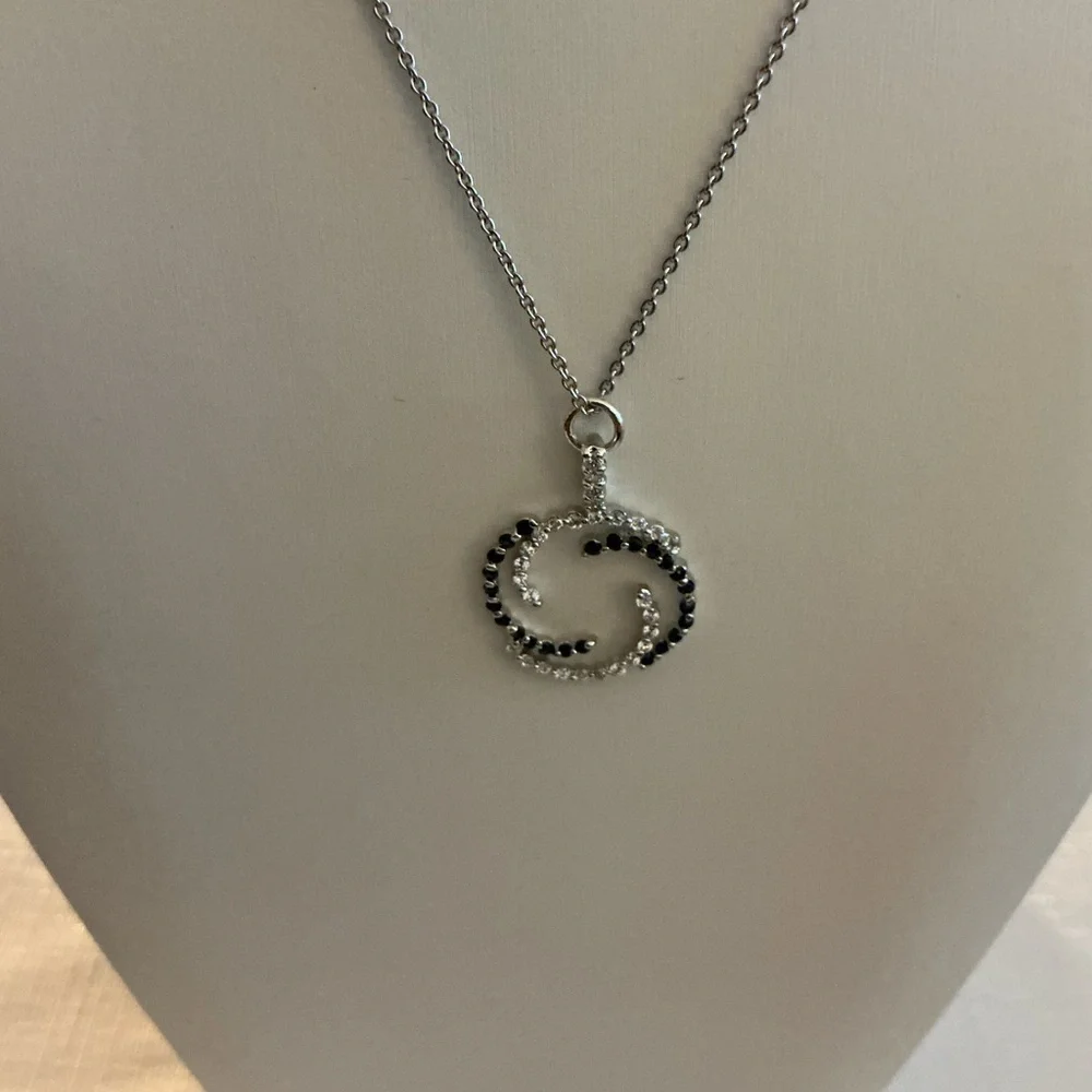 Black Rhinestone Necklace and Earrings pendant features