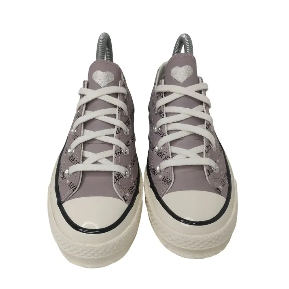 Converse purple leather