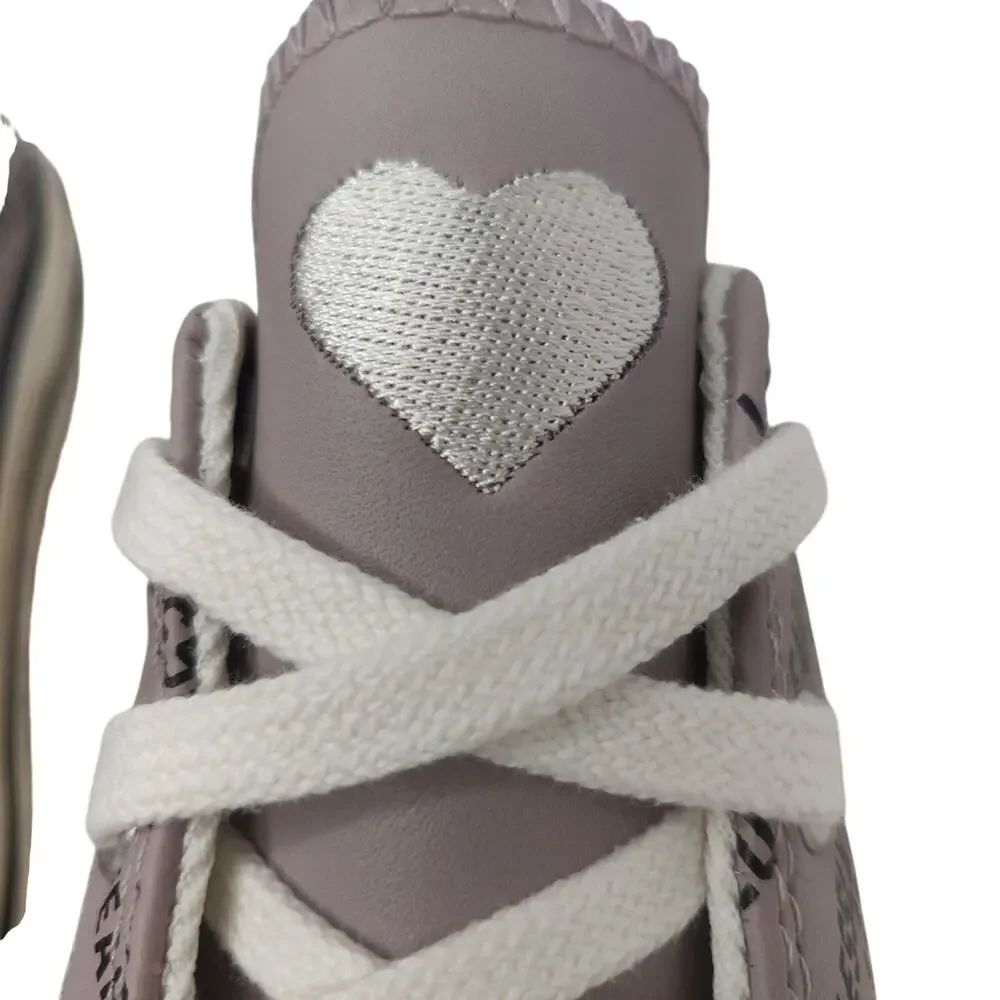 Converse purple leather