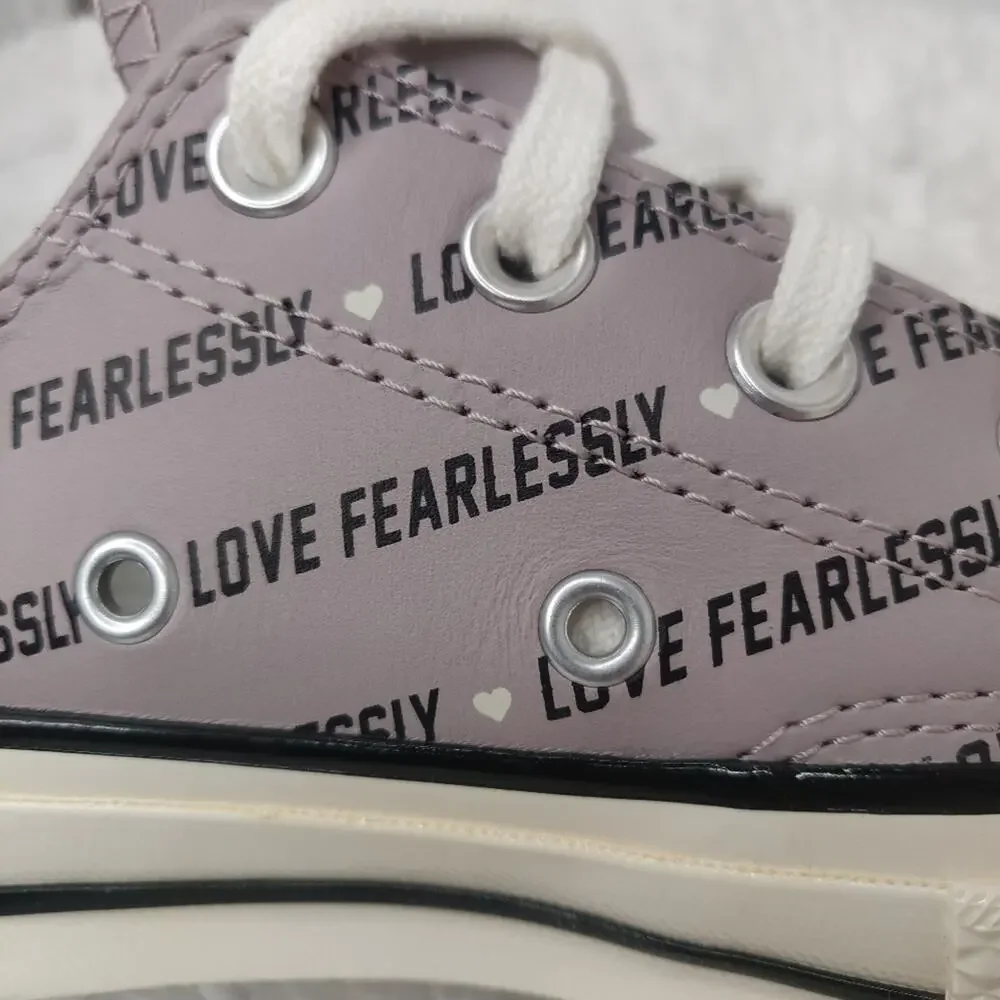 Converse purple leather