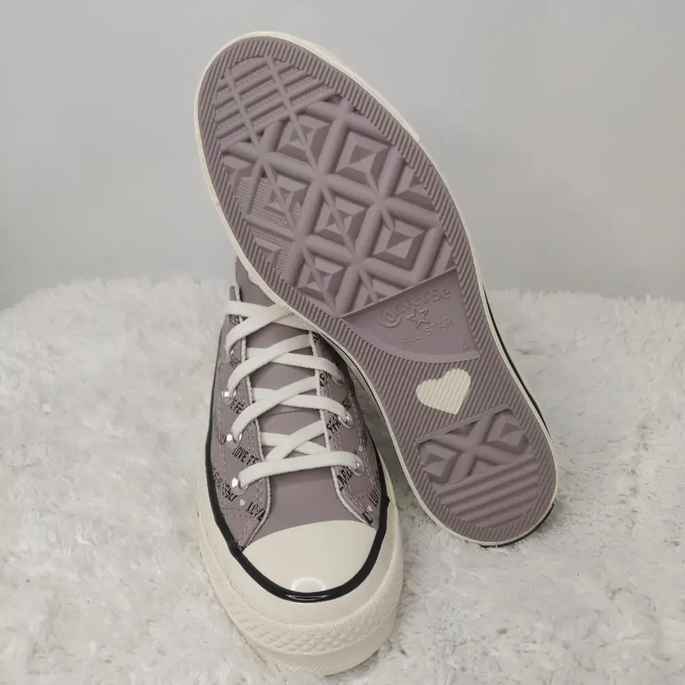 Converse purple leather