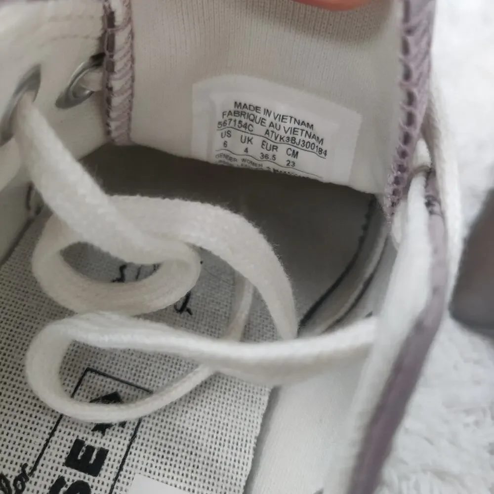 Converse purple leather