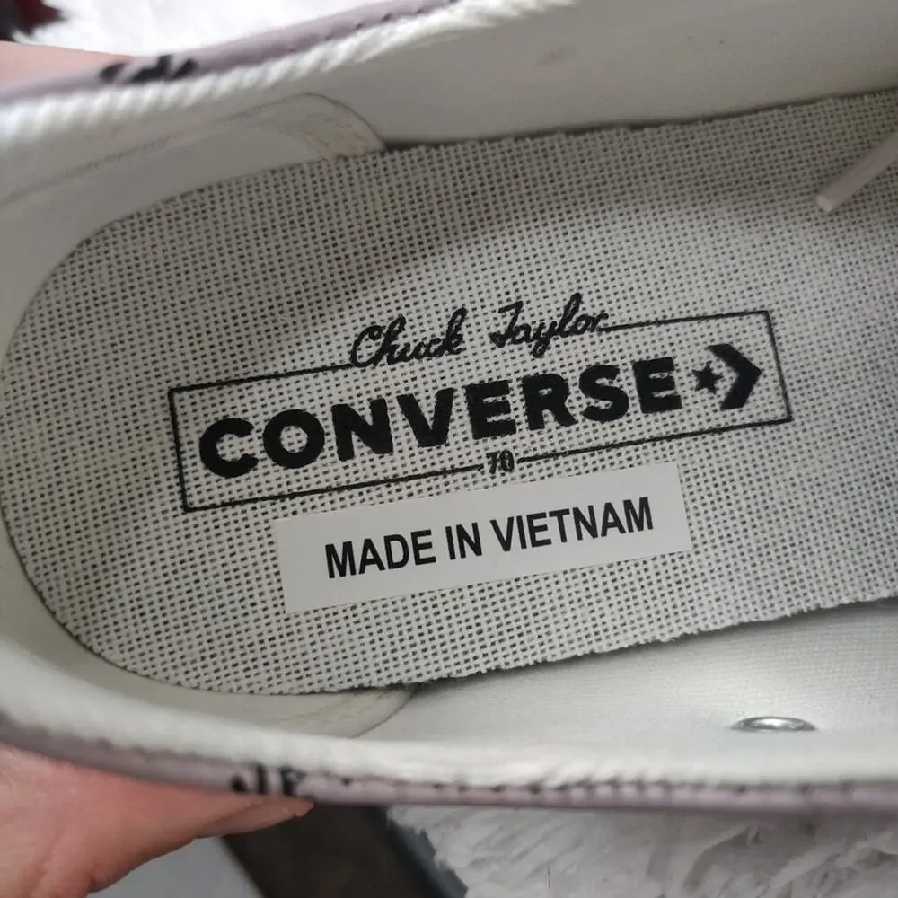 Converse purple leather