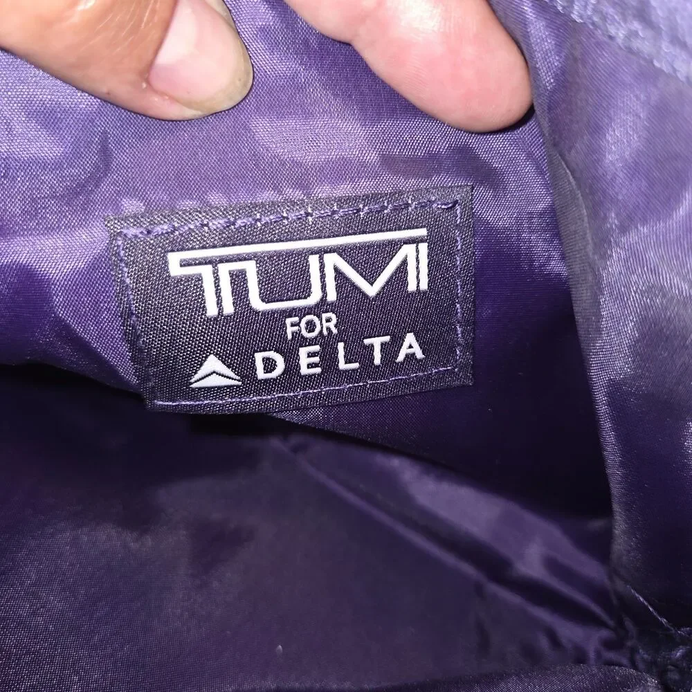 TRIM tumi delta