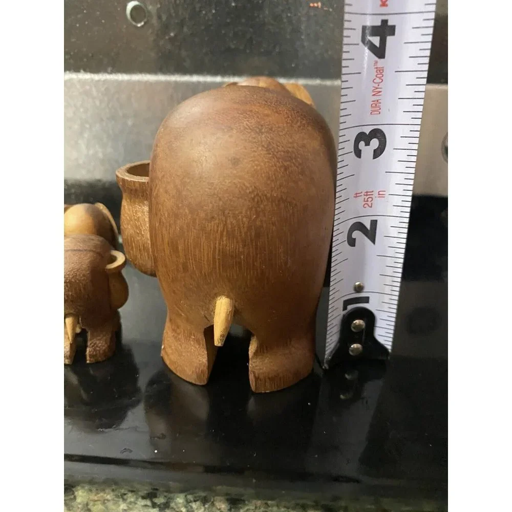 Unbranded carved wood three