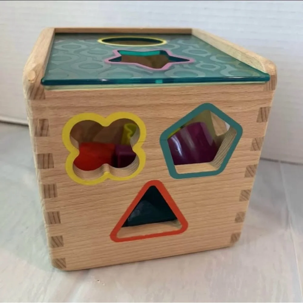 B. Toys Wooden Shape Sorting Cube Toy with 9 Shapes